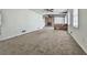 Spacious living room featuring a brick fireplace and lots of space for entertaining at 1090 Tanglewood Trl, Woodstock, GA 30189