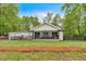 Charming renovated home with a welcoming front porch and well-maintained landscaping at 1965 Midway Rd, Douglasville, GA 30135