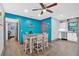Well-lit kitchen with a table, a door to the Primary bedroom, and stainless steel appliances at 1965 Midway Rd, Douglasville, GA 30135