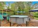 A lovely above ground pool surrounded by decking and lush landscaping, for fun summer days at 1965 Midway Rd, Douglasville, GA 30135