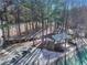 Peaceful picnic area with tables and benches adjacent to the tennis courts at 2112 Little River Dr, Suwanee, GA 30024
