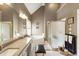 Bright bathroom with double vanity, separate shower, tub, and neutral toned walls at 3290 Winthrop Ne Cir, Marietta, GA 30067