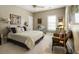 Comfortable bedroom with a cozy bed, chair, bedside table, and carpeted floor at 3290 Winthrop Ne Cir, Marietta, GA 30067
