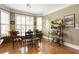 Bright dining area with large windows, window seat, and hardwood floors, perfect for enjoying meals at 3290 Winthrop Ne Cir, Marietta, GA 30067