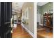 Inviting foyer with hardwood floors, elegant lighting, and views into the living spaces at 3290 Winthrop Ne Cir, Marietta, GA 30067