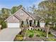 Charming brick home with a well-manicured lawn, two-car garage, and inviting front entrance at 3290 Winthrop Ne Cir, Marietta, GA 30067