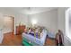 Bright bedroom featuring hardwood floors and natural light at 1800 Clairmont Lk # 427, Decatur, GA 30033