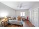 Bedroom with wood floors, ceiling fan and window providing natural light at 1800 Clairmont Lk # 427, Decatur, GA 30033
