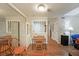 Bright dining area with wood-look floors and a view through to other rooms at 1800 Clairmont Lk # A427, Decatur, GA 30033