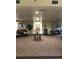 Spacious hallway with a piano, seating, and decorative table, creating an inviting atmosphere at 1800 Clairmont Lk # A427, Decatur, GA 30033