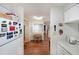 Cozy kitchen and dining area with wood-look flooring, white cabinets, and appliances at 1800 Clairmont Lk # A427, Decatur, GA 30033