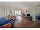 Spacious living room featuring a large window, wood-look floors and neutral tones at 1800 Clairmont Lk # A427, Decatur, GA 30033