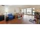 Bright living room with wood-look flooring and comfortable seating at 1800 Clairmont Lk # A427, Decatur, GA 30033