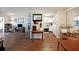 Open-concept living area with hardwood floors, seamlessly connecting the kitchen and living spaces for modern living at 1800 Clairmont Lk # A427, Decatur, GA 30033