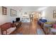 Inviting living room with wood-look floors flowing into the kitchen and dining area at 1800 Clairmont Lk # A427, Decatur, GA 30033