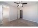 Bedroom with a ceiling fan, neutral walls and carpet at 241 Rockingham Dr, Loganville, GA 30052