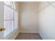 Walk-in closet with carpet and built-in shelving at 241 Rockingham Dr, Loganville, GA 30052