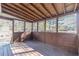 Spacious enclosed sunroom provides a relaxing space overlooking the backyard at 241 Rockingham Dr, Loganville, GA 30052