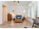 Sun-filled bedroom featuring high ceilings, a ceiling fan, and wood floors at 437 Great Pine Way, Woodstock, GA 30188