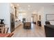 Spacious open kitchen featuring a large island, stainless appliances, and access to the living room at 437 Great Pine Way, Woodstock, GA 30188