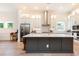 Stylish kitchen featuring a large island, stainless steel appliances, and plenty of counter space at 437 Great Pine Way, Woodstock, GA 30188