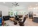 Bright, open floor plan with hardwood floors, expansive windows, and a seamless flow between living spaces at 437 Great Pine Way, Woodstock, GA 30188