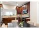 Eat-in kitchen with stainless steel appliances and ample cabinet space at 67 25Th Nw St # 5, Atlanta, GA 30309