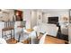 Open floor plan with a kitchen bar and a cozy living room area at 67 25Th Nw St # 5, Atlanta, GA 30309