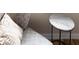 Living room featuring plush pillows with small marble side table, creating a comfortable and stylish space at 67 25Th Nw St # 5, Atlanta, GA 30309
