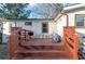 Backyard deck perfect for entertaining with a grill and outdoor seating at 1486 Akridge Nw St, Atlanta, GA 30314