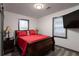 Bedroom with a queen bed, TV, and a dark grey trim at 1486 Akridge Nw St, Atlanta, GA 30314