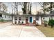 Charming single-story home with a bright blue front door and a cozy, inviting entrance at 1486 Akridge Nw St, Atlanta, GA 30314