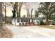 A charming single-story home featuring a long driveway and a beautifully maintained front yard at 1486 Akridge Nw St, Atlanta, GA 30314