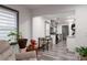 Living room view into updated kitchen with modern appliances and finishes at 1486 Akridge Nw St, Atlanta, GA 30314