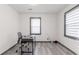 Clean office setup featuring desk, chair, and natural light from windows at 1486 Akridge Nw St, Atlanta, GA 30314