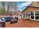 Inviting outdoor living space with plush seating on a spacious deck at 226 Double Gate Ct, Sugar Hill, GA 30518