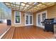 Outdoor entertainment space featuring a grill, patio and access to the yard at 226 Double Gate Ct, Sugar Hill, GA 30518