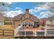Home showcasing a large backyard with a wooden deck at 226 Double Gate Ct, Sugar Hill, GA 30518