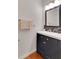 Bathroom vanity with modern finishes and stylish mirror at 226 Double Gate Ct, Sugar Hill, GA 30518