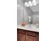 Bathroom with wood cabinets and a white counter at 226 Double Gate Ct, Sugar Hill, GA 30518