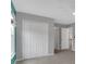 Bedroom with a closet, gray walls, and white doors at 226 Double Gate Ct, Sugar Hill, GA 30518