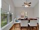 Bright breakfast nook with natural light, view of backyard, and seating for four at 226 Double Gate Ct, Sugar Hill, GA 30518
