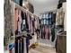 Organized walk-in closet providing substantial storage options at 226 Double Gate Ct, Sugar Hill, GA 30518