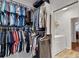 Spacious walk-in closet with ample storage and access to a laundry area at 226 Double Gate Ct, Sugar Hill, GA 30518
