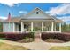 Clubhouse exterior with a covered patio area, perfect for gatherings and relaxation at 226 Double Gate Ct, Sugar Hill, GA 30518
