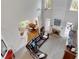 Sunlit living room with fireplace and view of dining area at 226 Double Gate Ct, Sugar Hill, GA 30518