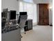 Office area featuring multiple desks and computer monitors at 226 Double Gate Ct, Sugar Hill, GA 30518