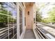 Exterior balcony view with metal railing and trees creating a green space feel at 225 E Ponce De Leon Ave # 317, Decatur, GA 30030