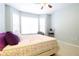 This is a relaxing bedroom with comfortable seating and a large window for natural light at 225 E Ponce De Leon Ave # 317, Decatur, GA 30030