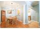 Charming dining area with hardwood floors, modern lighting, and an open connection to the kitchen at 225 E Ponce De Leon Ave # 317, Decatur, GA 30030